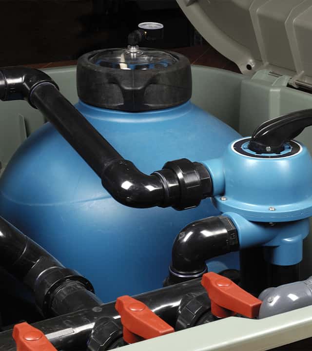 A picture of a pool pump assembly.